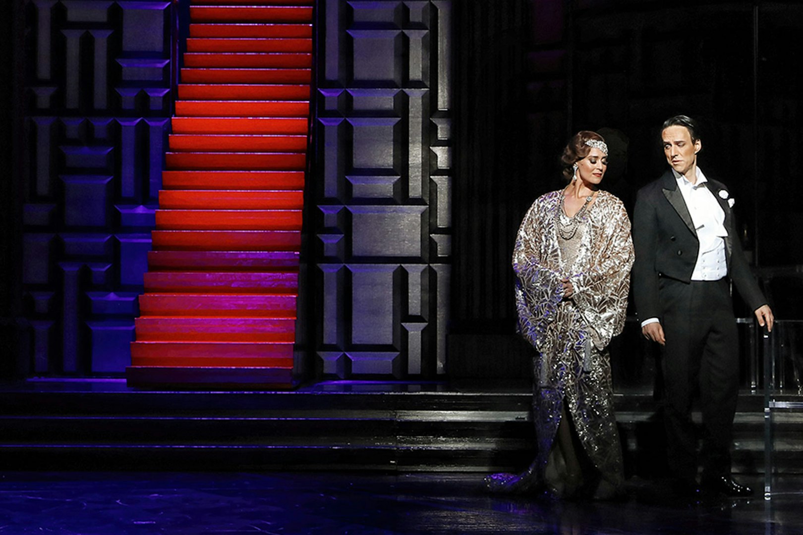 Theatrical performance of The Merry Widow in Sydney with actors in formal attire.