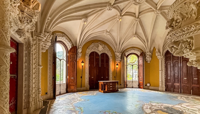 Quinta de Regaleira ornate interiors with intricate carvings in Sintra, Portugal.