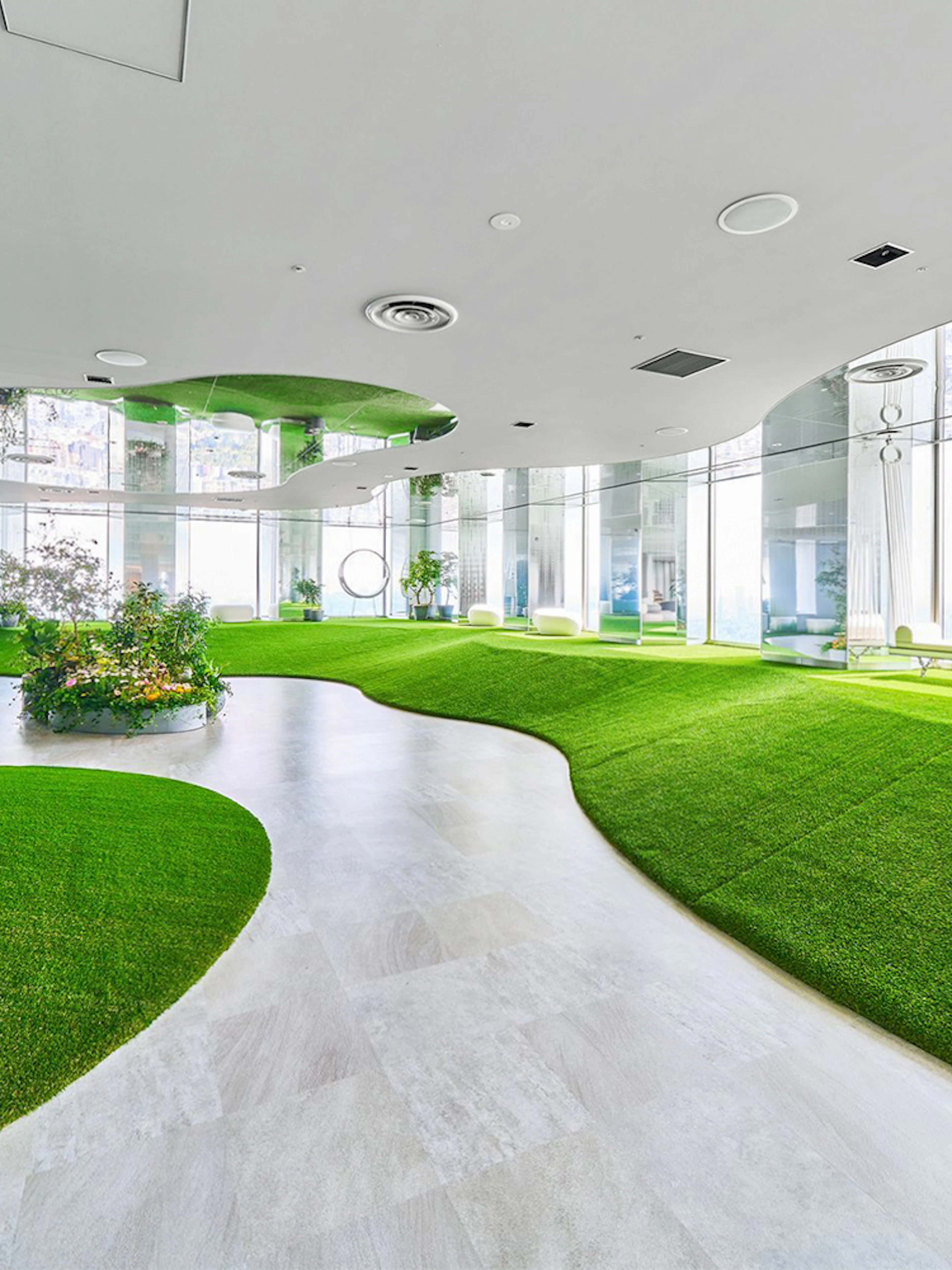 Sunshine 60 Observatory Tenbou Park interior with green artificial hills and plants.