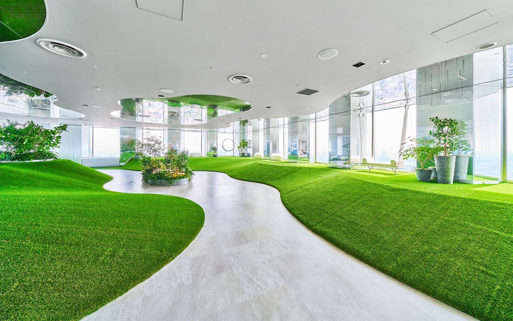 Sunshine 60 Observatory Tenbou Park interior with green artificial hills and plants.