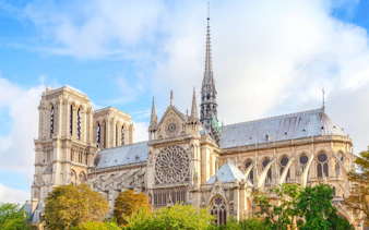 Notre Dame Cathedral in Paris with its iconic towers and detailed facade.