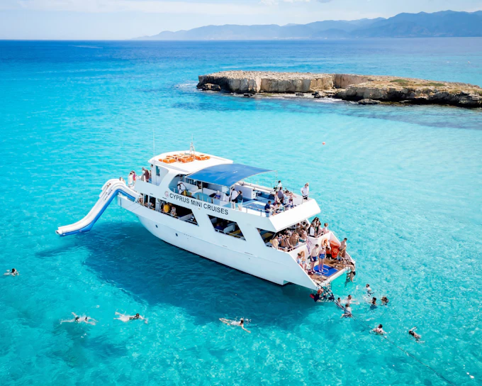 From Paphos: Aphrodite鈥檚 Akamas Blue Lagoon Bus & Boat Tour with Waterslide