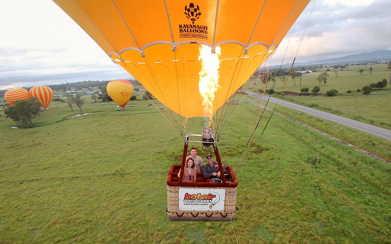 Hot air balloon ride over scenic landscape, Gold Coast, Australia.