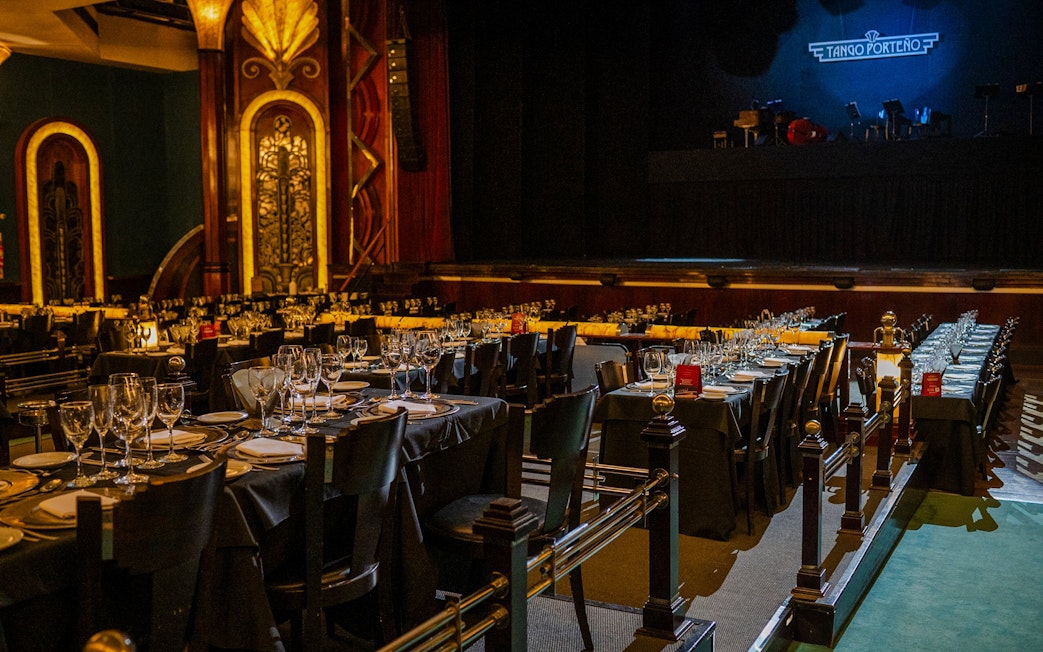 Dining tables set for guests at Tango Porteño Show in Buenos Aires.