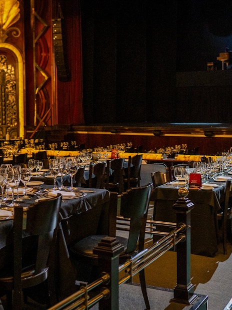 Dining tables set for guests at Tango Porteño Show in Buenos Aires.