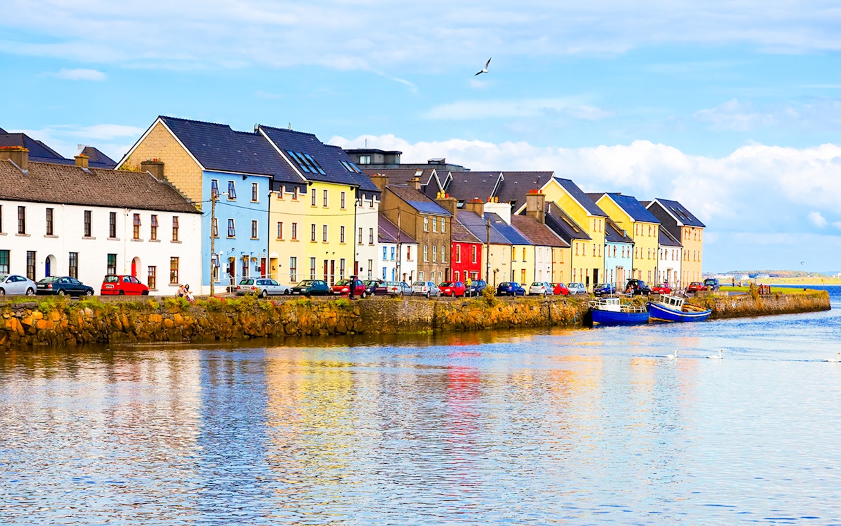 Colorful houses along the waterfront in The Claddagh, Galway.