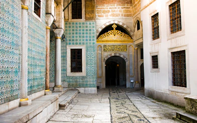 Courtyard of the Eunuchs with ornate tiles and archway, Topkapi Palace, Istanbul.
