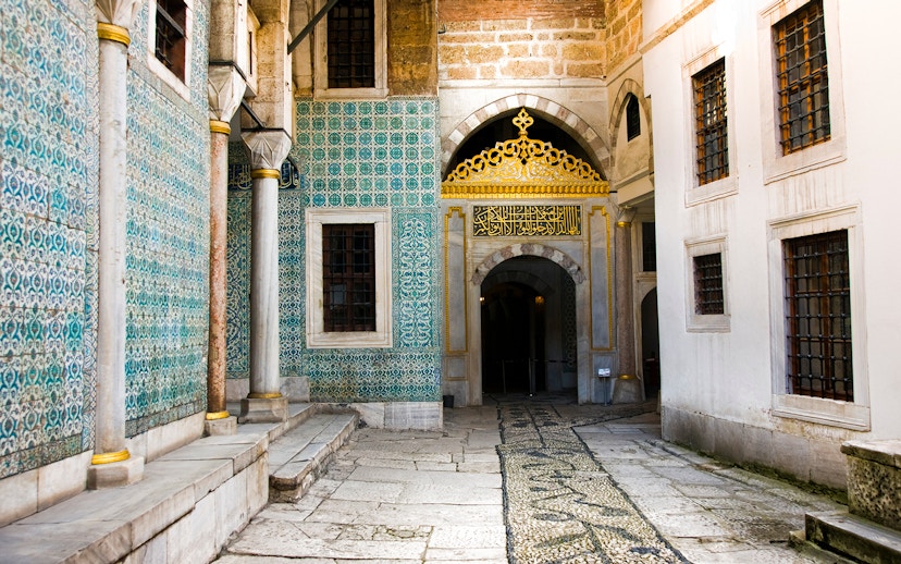 Courtyard of the Eunuchs with ornate tiles and archway, Topkapi Palace, Istanbul.