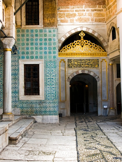 Courtyard of the Eunuchs with ornate tiles and archway, Topkapi Palace, Istanbul.