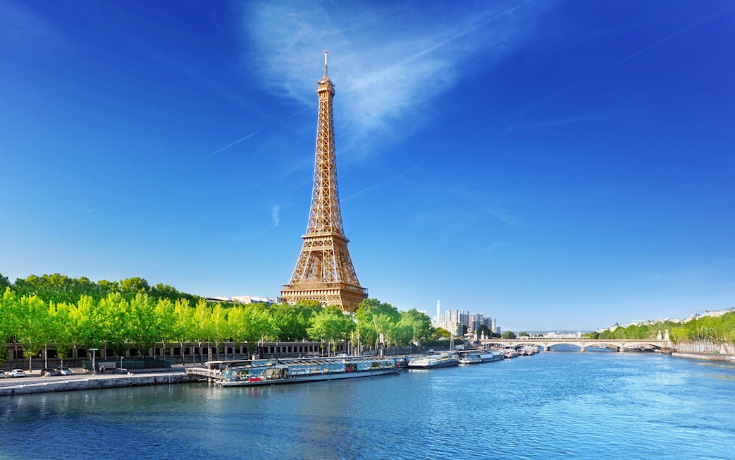 Eiffel Tower view from Seine River, Paris city pass with 2nd floor access.