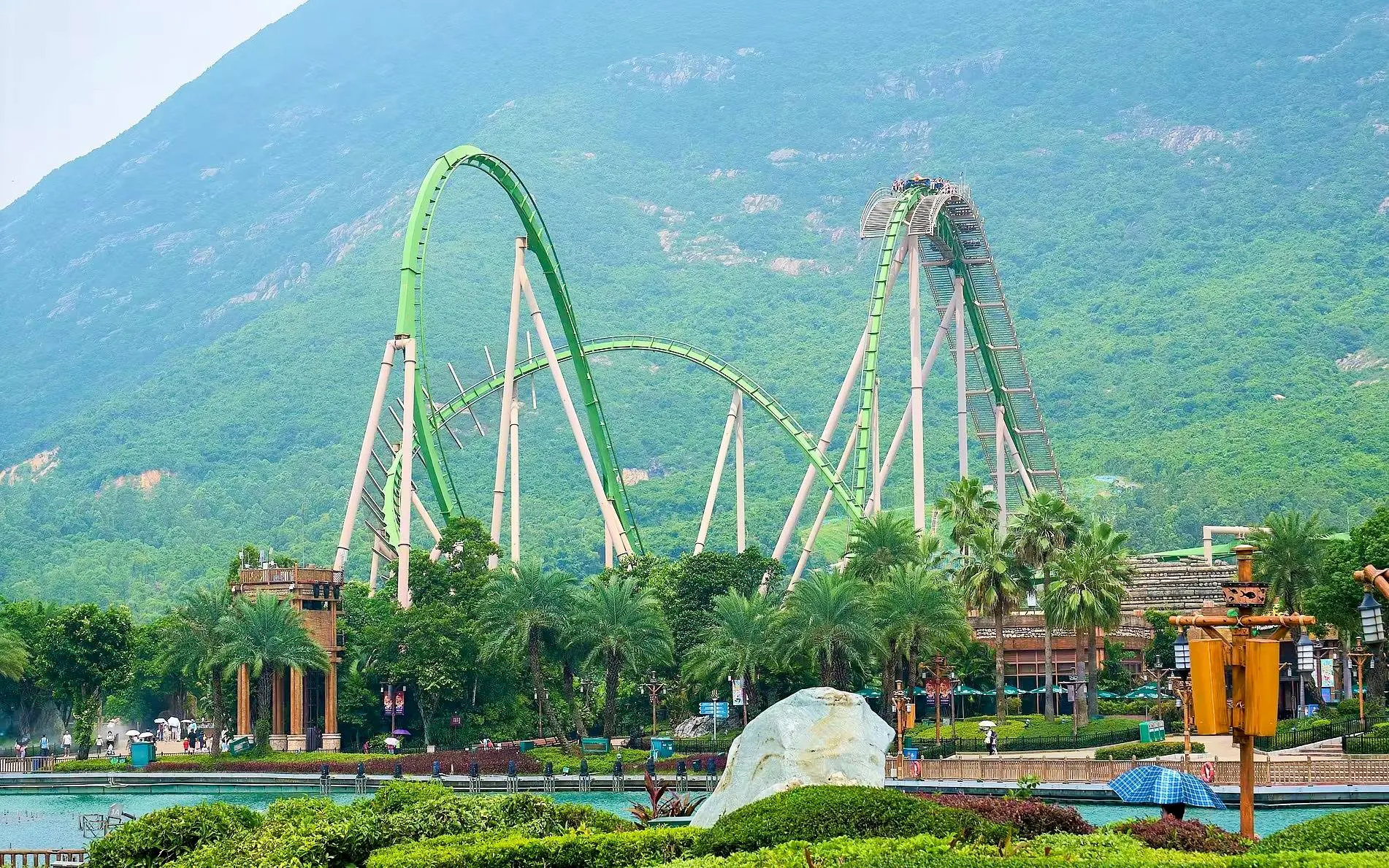 Parrot Coaster at Chimelong Ocean Kingdom with lush greenery in Zhuhai, China.