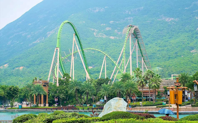 Parrot Coaster at Chimelong Ocean Kingdom with lush greenery in Zhuhai, China.