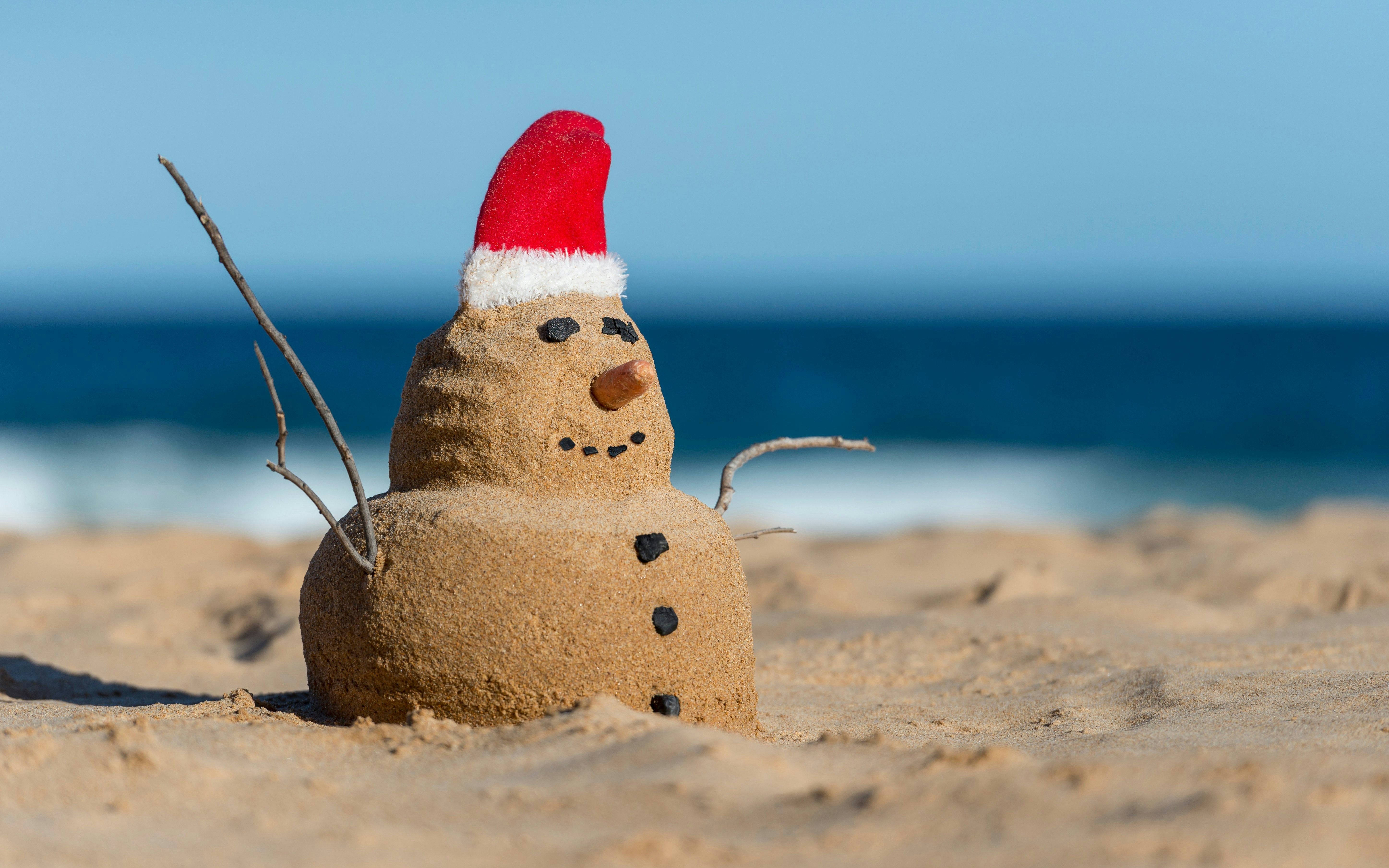 Australian Christmas Sandman with decoration on the iconic Bondi Beach in Sydney