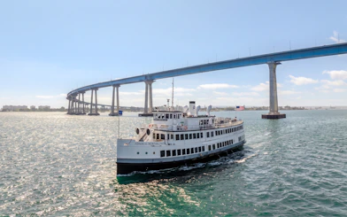 San Diego dinner cruise ship passing under Key Bridge.