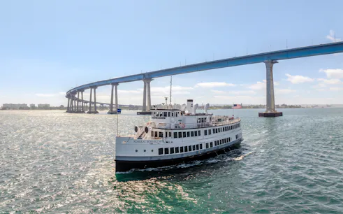 San Diego dinner cruise ship passing under Key Bridge.