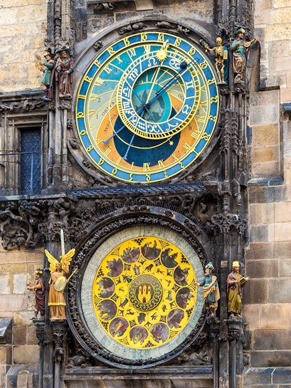 Astronomical Clock in Prague with zodiac signs and detailed sculptures.