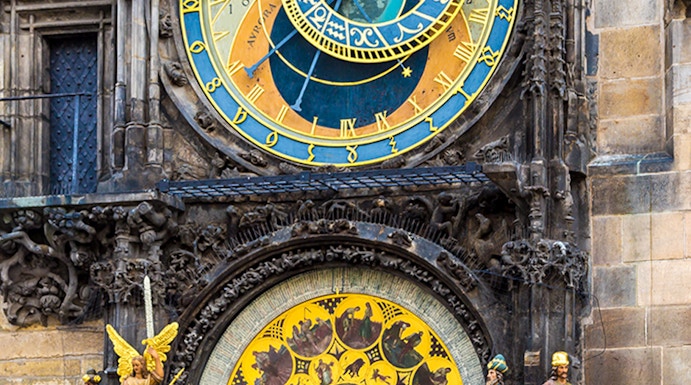 Astronomical Clock in Prague with zodiac signs and detailed sculptures.