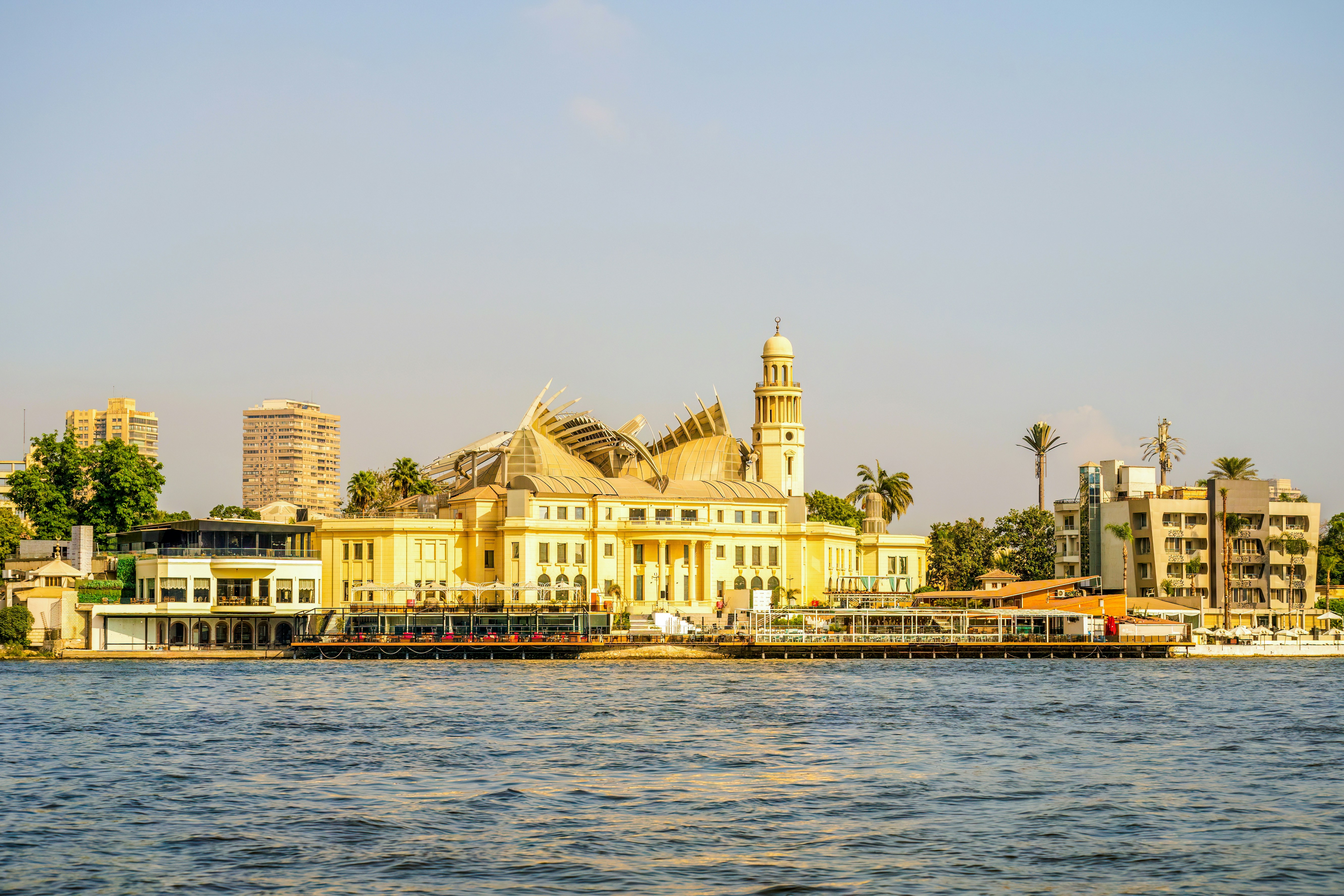 Zamalek Waterfront with historic yellow building and river view in Cairo, Egypt.
