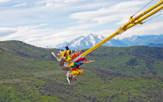 Giant Canyon Swing with Mt. Sopris in background at Glenwood Caverns Adventure Park.
