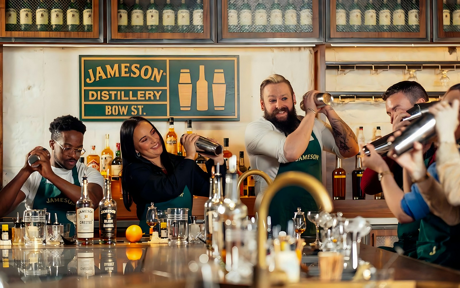 Jameson Distillery cocktail-making class with whiskey bottles and mixing tools in Dublin.
