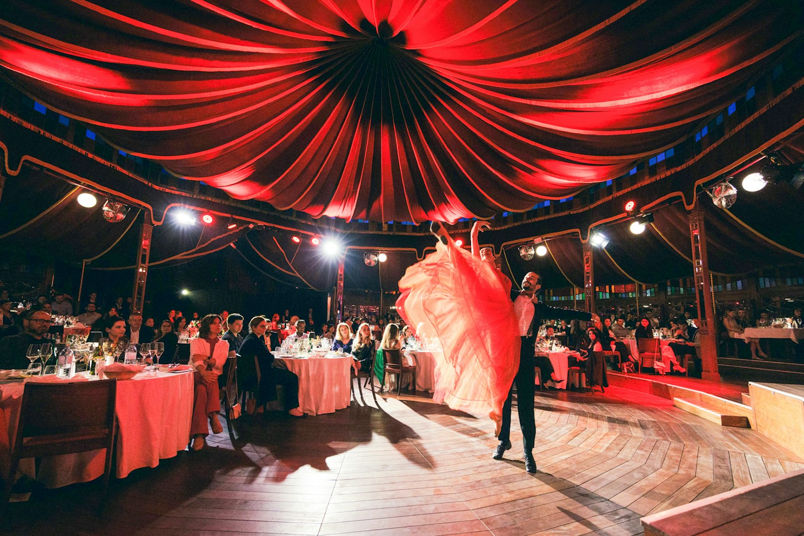 Dancers performing at a Strauss concert with guests dining at Prater Vienna's Mirage.