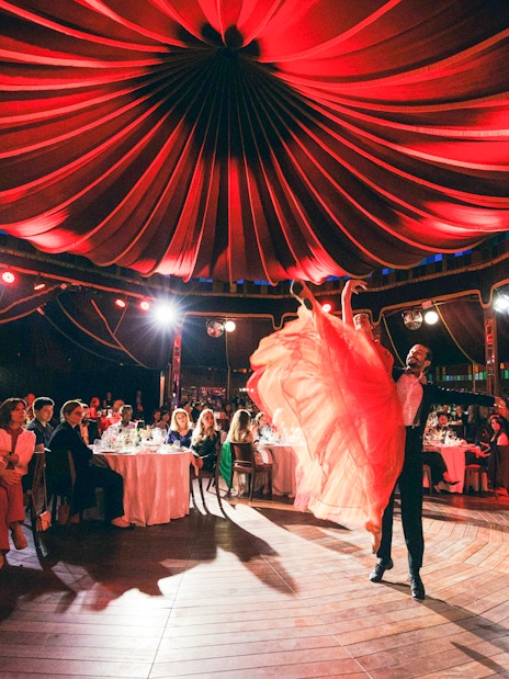 Dancers performing at a Strauss concert with guests dining at Prater Vienna's Mirage.