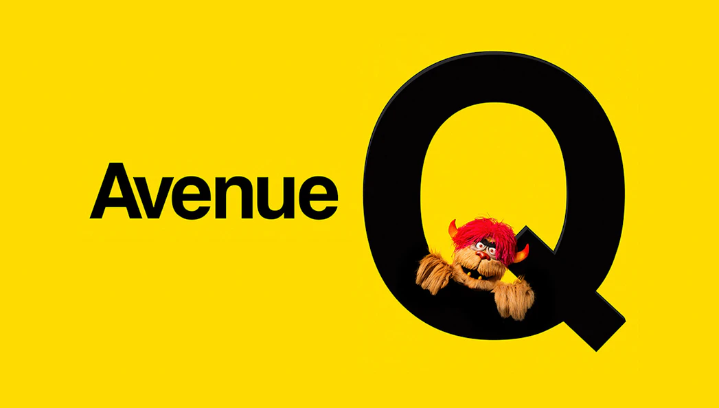 Avenue Q logo with puppet character peeking through the letter Q, promoting West End show.