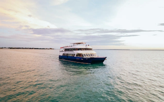 Cruise boat on Darwin Harbour during lunch tour.