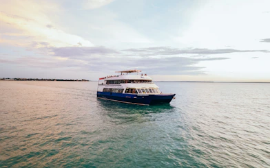 Cruise boat on Darwin Harbour during lunch tour.