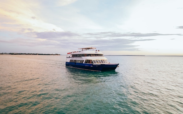 Cruise boat on Darwin Harbour during lunch tour.