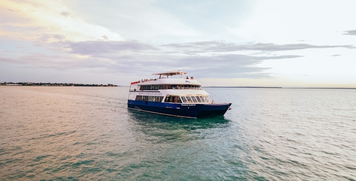 Cruise boat on Darwin Harbour during lunch tour.