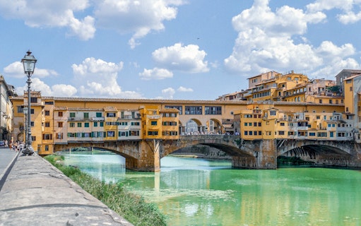 Ponte Vecchio bridge over the Arno River in Florence, Italy, part of Medici’s Mile tour.