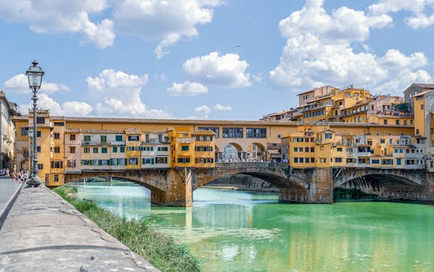Ponte Vecchio bridge over the Arno River in Florence, Italy, part of Medici’s Mile tour.