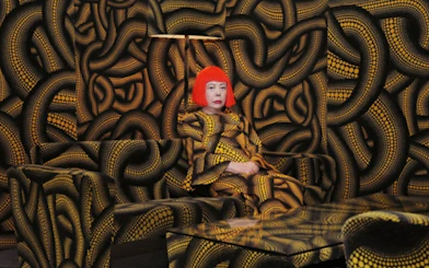 Yayoi Kusama installation at Stedelijk Museum Amsterdam with patterned walls and furniture.