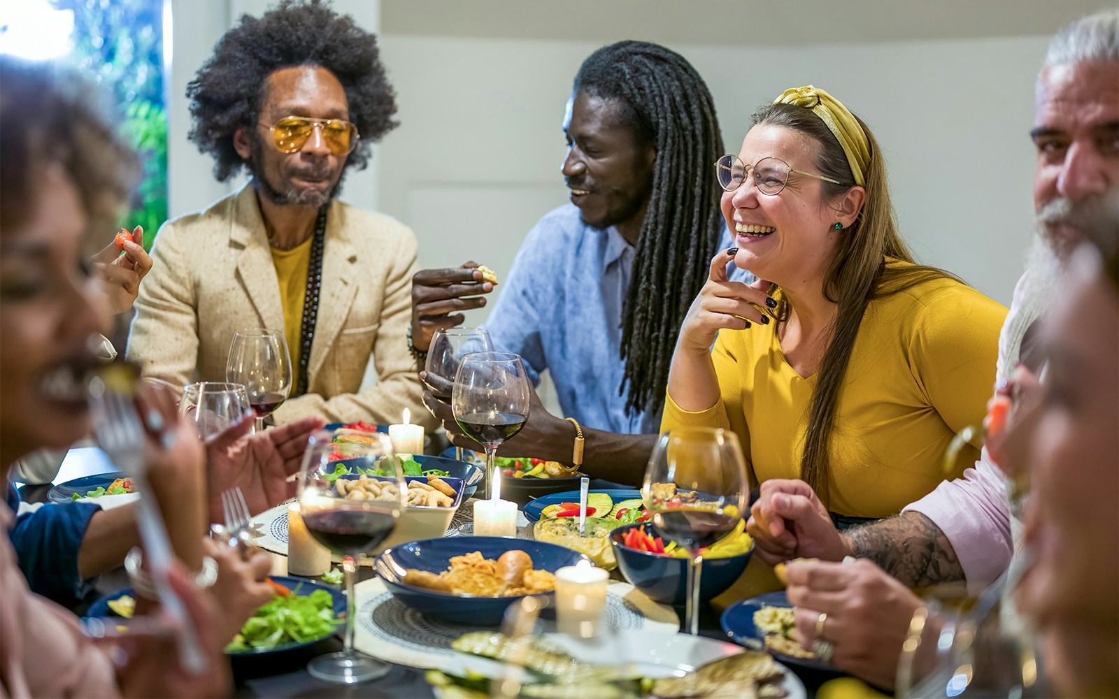 Dining experience at a Disneyland Paris restaurant with diverse group enjoying a meal.