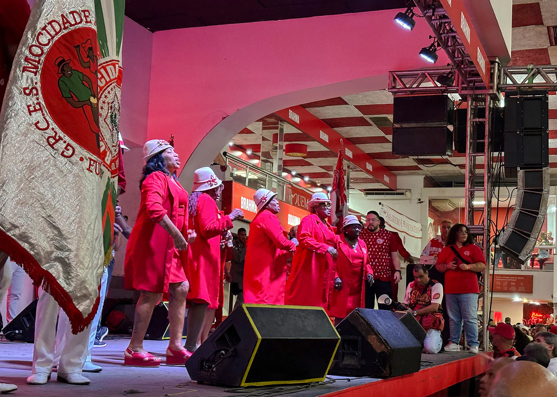 Salgueiro samba performers in red costumes at Rio Carnival rehearsal, Rio de Janeiro.