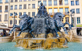 Bartholdi Fountain with horses and figures at Place des Terreaux, Lyon, France.