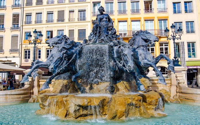 Bartholdi Fountain with horses and figures at Place des Terreaux, Lyon, France.