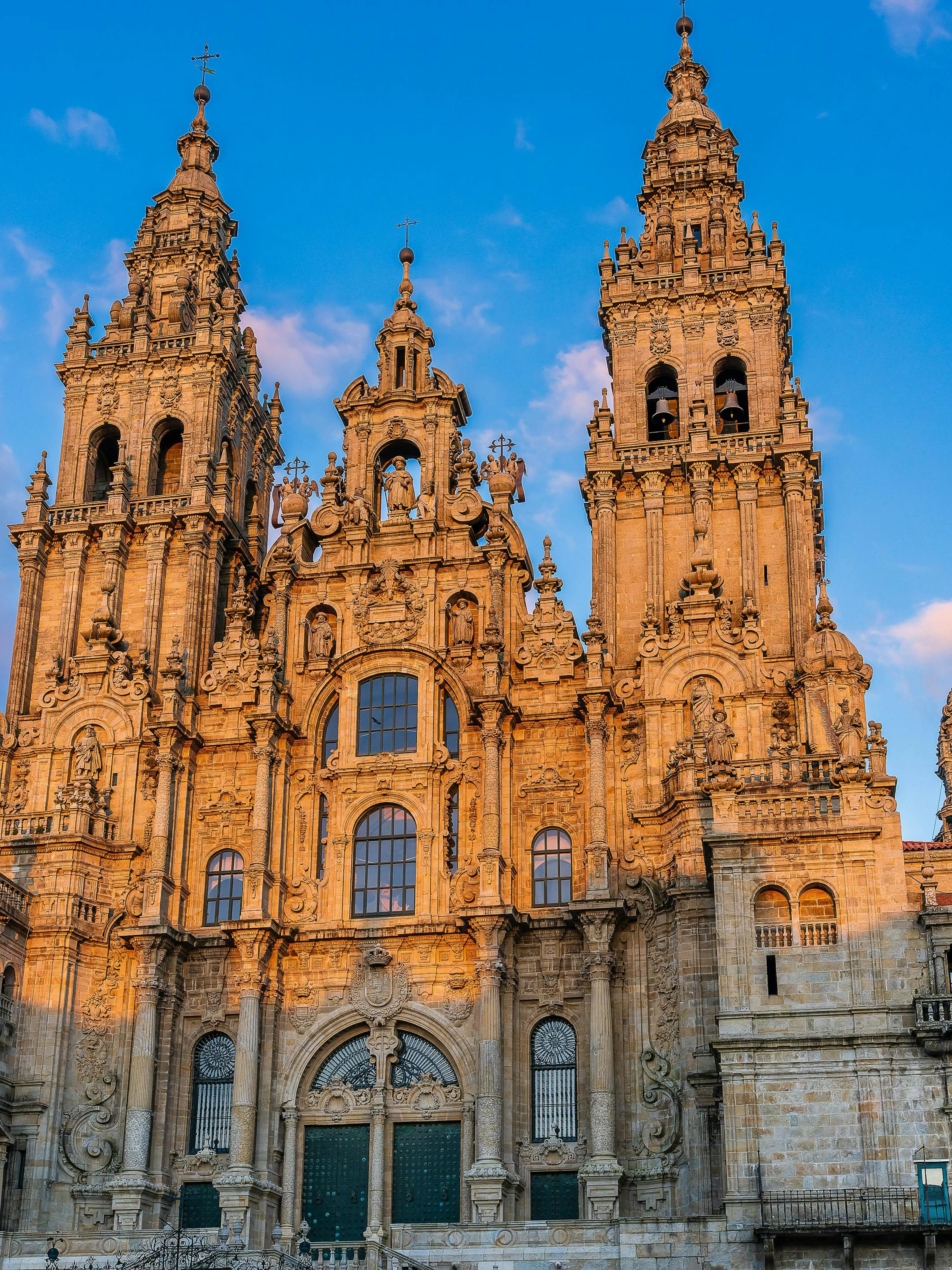 Facade of the Cathedral of Santiago de Compostela at sunset, Galicia, Spain.