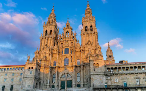 Facade of the Cathedral of Santiago de Compostela at sunset, Galicia, Spain.