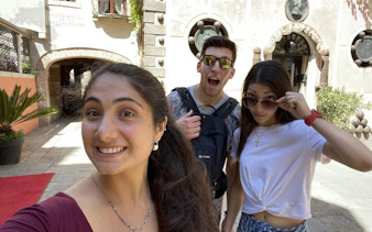 Selfie of three people enjoying the Venice Holy Heist city exploration game near Hotel San Fantin.