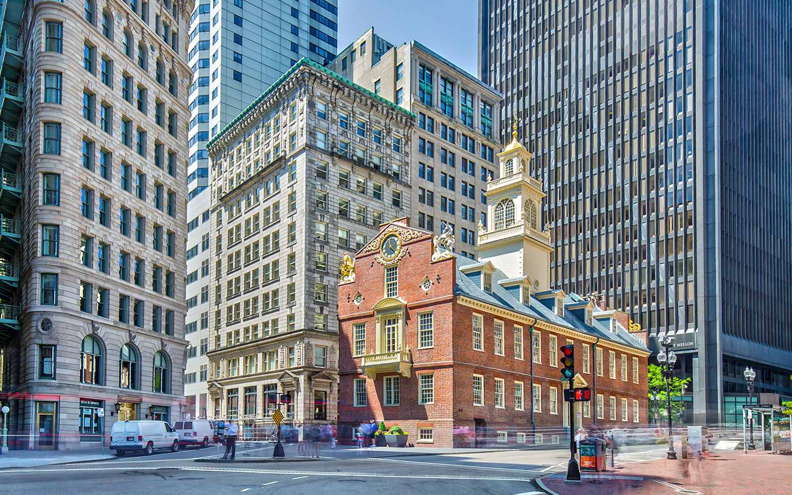 Old State House in Boston surrounded by modern skyscrapers.