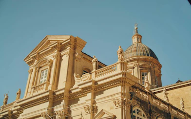 Baroque architecture of Dubrovnik Cathedral dome and statues, Dubrovnik Old Town.