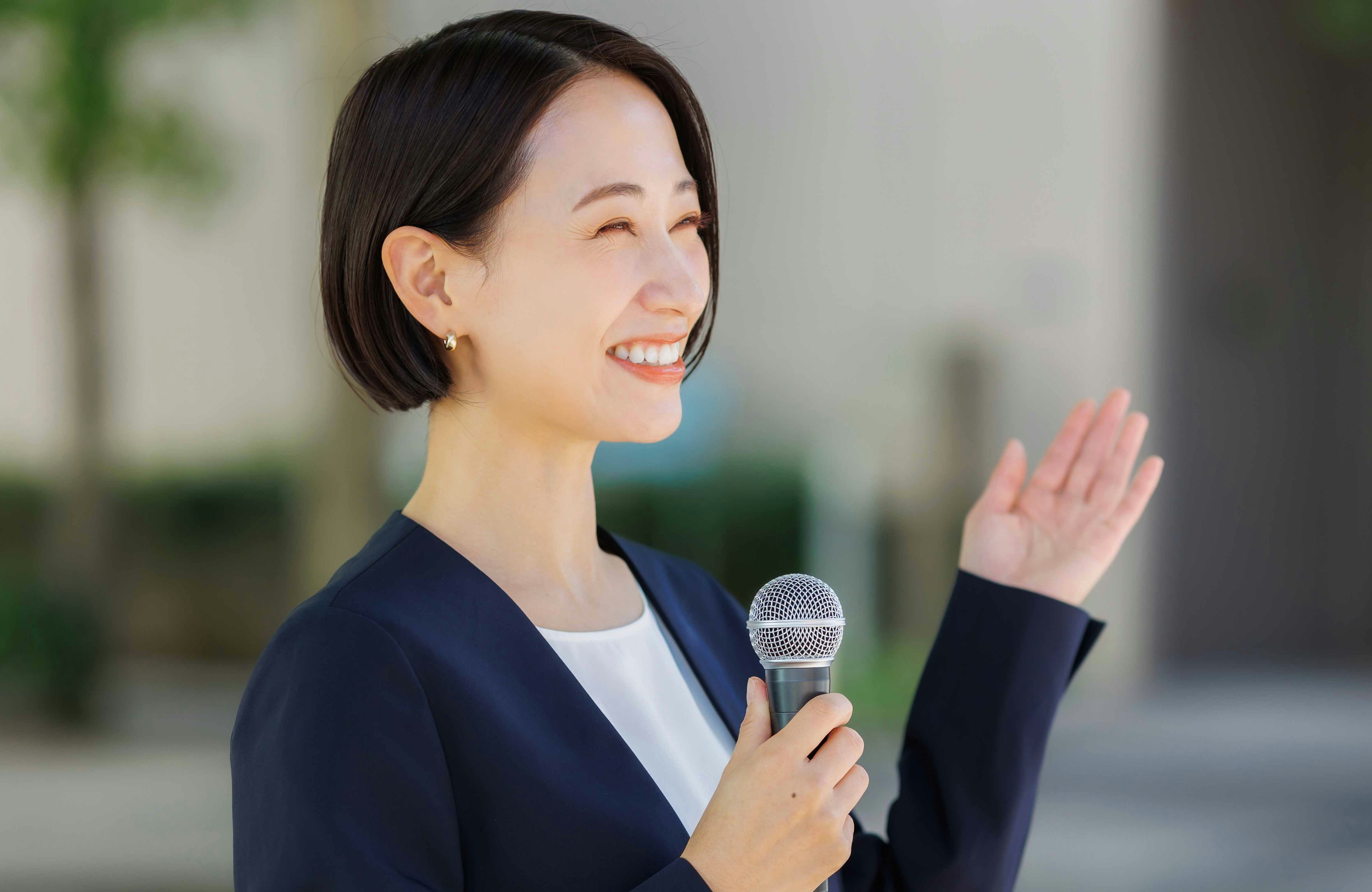 Tour guide providing live commentary with a microphone.