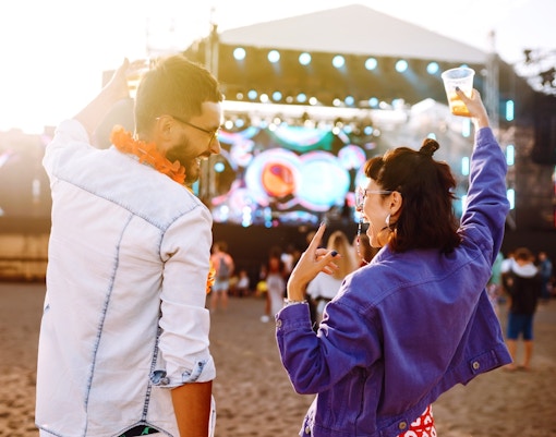 Couple enjoying an outdoor concert