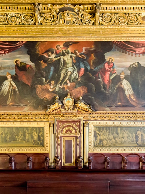 Painting in Doge's Palace depicting historical figures and religious scene, Venice, Italy.