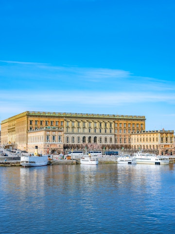 Gamla Stan and Royal Palace with boats on the waterfront in Stockholm, Sweden.