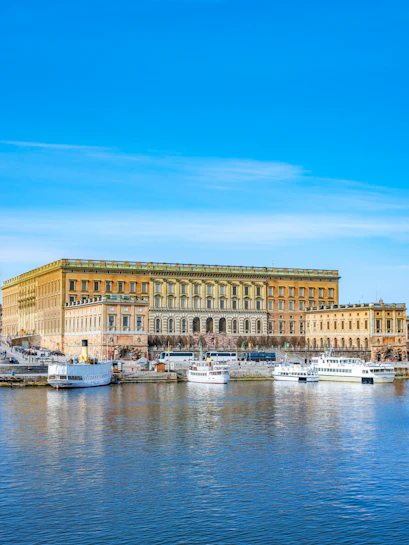 Gamla Stan and Royal Palace with boats on the waterfront in Stockholm, Sweden.