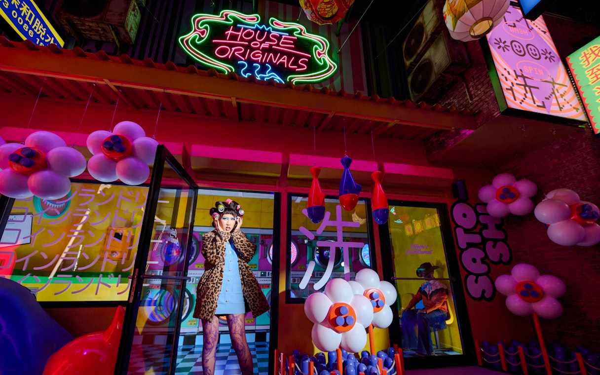 Person in costume at House of Originals, Enchanted Carnival, Halloween Experience.