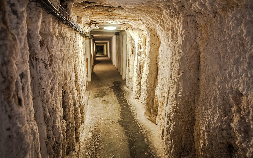 Wieliczka Salt Mine underground passageway with textured salt walls.